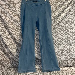 Gently worn stretchy like faded look denim flare/ slightly wide leg jeans